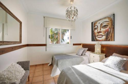 Ένα ή περισσότερα κρεβάτια σε δωμάτιο στο INIBIZA VILLAS - Villa Juncos