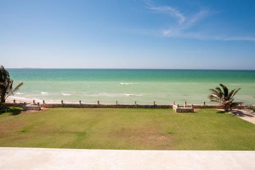 a view of the ocean from the balcony of a beach at 97985 Stunning beachfront Suites Wi-Fi East of Progreso in Chicxulub
