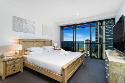 Ένα ή περισσότερα κρεβάτια σε δωμάτιο στο Coastal Skyline Luxury Suite