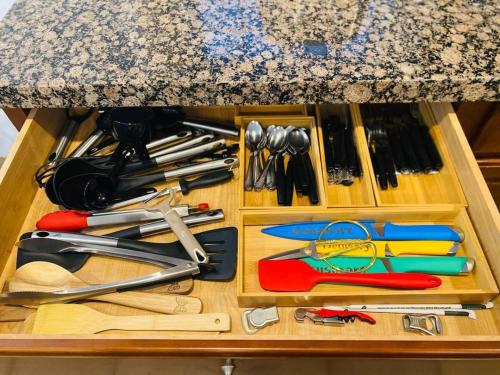 a wooden drawer filled with lots of different tools at 180 Perfect for large groups in Coachella