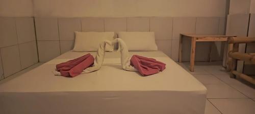 Ένα ή περισσότερα κρεβάτια σε δωμάτιο στο Bale Hendi