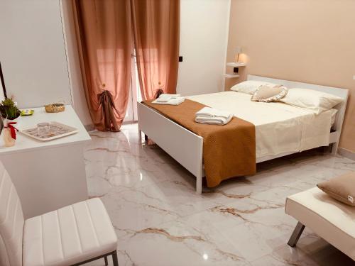 Postel nebo postele na pokoji v ubytování B&B A un passo dal mare