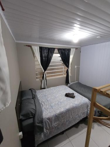Katil atau katil-katil dalam bilik di Hotel Pousada Roma