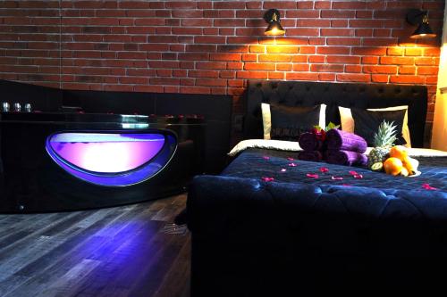 Posteľ alebo postele v izbe v ubytovaní Spa Bath Apartment