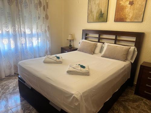 Posteľ alebo postele v izbe v ubytovaní Homely Apartments Centro