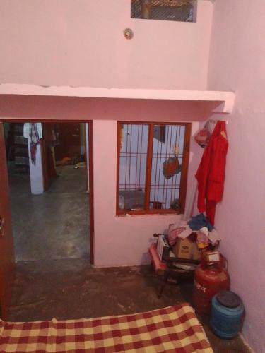 Ένα ή περισσότερα κρεβάτια σε δωμάτιο στο Vaishya Niwas