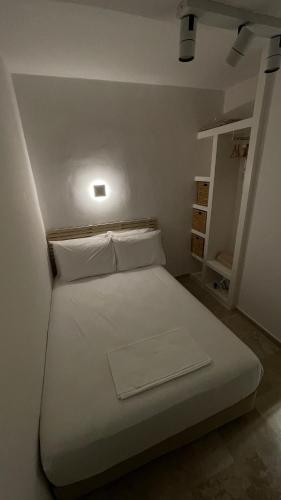 Postel nebo postele na pokoji v ubytování ZenSo Studios