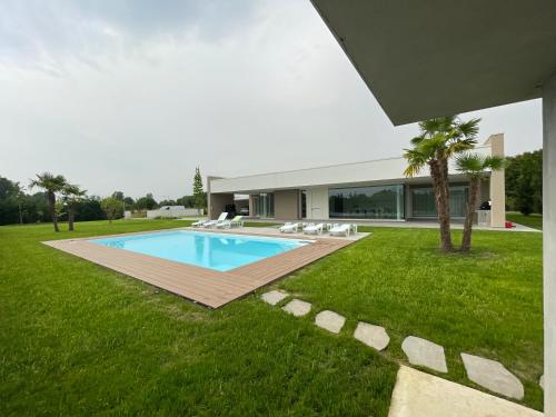 Πισίνα στο ή κοντά στο STIMAHome villa con piscina privata