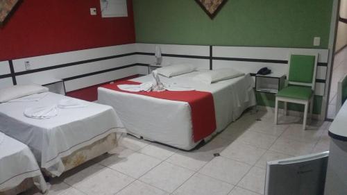 Cama o camas de una habitación en Hotel do Papai Noel