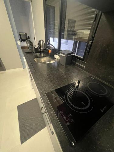 Dapur atau dapur kecil di Hospedagem Confortável e Prática para viajantes e férias - Próxima à BR-101