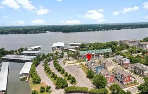 an aerial view of a city with a red marker at The Lakeside Landing in Nashville