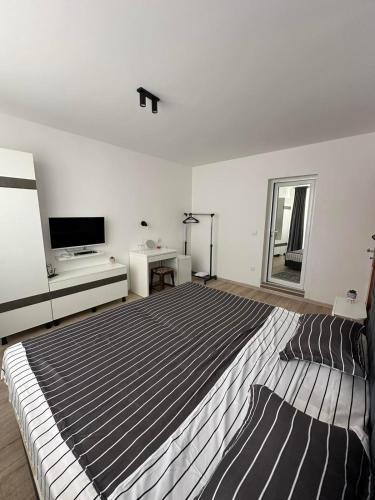 Ένα ή περισσότερα κρεβάτια σε δωμάτιο στο Manolovi Guest House
