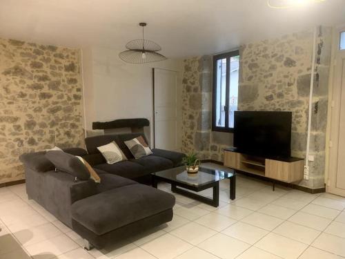 Khu vực ghế ngồi tại Charmante Maison De Ville