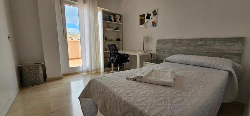 Postel nebo postele na pokoji v ubytování Hostel Residencia Alfil