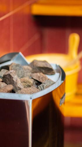 a container of food sitting on top of a table at Vila Parc in Sovata