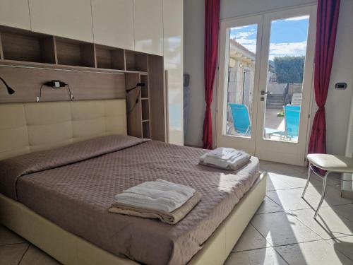Postel nebo postele na pokoji v ubytování Casa Sinzias con piscina 9 posti letto