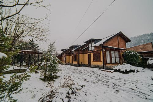 Cabañas Patagonia Rupestre om vinteren