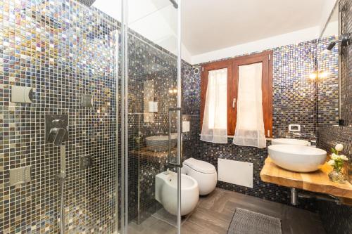Koupelna v ubytování Loft Rooms I Cinque Mori