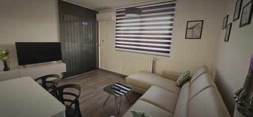 Een TV en/of entertainmentcenter bij Mars E-4
