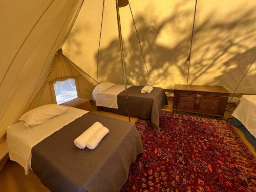 Katil atau katil-katil dalam bilik di LOUSAL TENTS Grandola