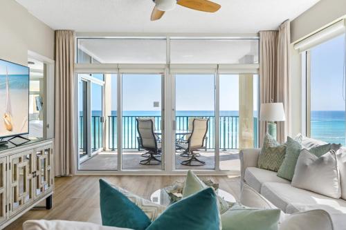 a living room with a view of the ocean at Jade East Towers 0550 by Newman-Dailey in Destin