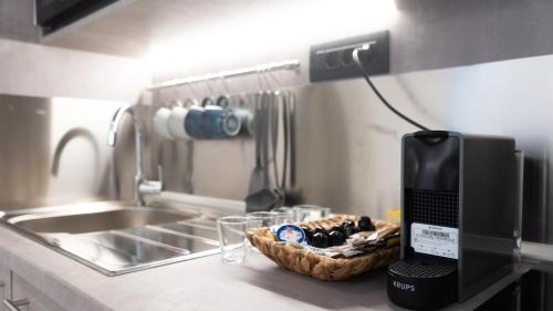 Kuchyň nebo kuchyňský kout v ubytování Biancasette Apartments