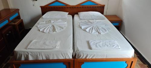 Katil atau katil-katil dalam bilik di Agrellis Apartments