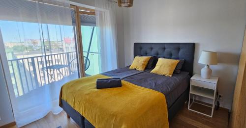 En eller flere senge i et værelse på City Stay Tallinn apartment with seaview