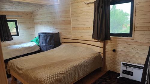 Postel nebo postele na pokoji v ubytování Giarants