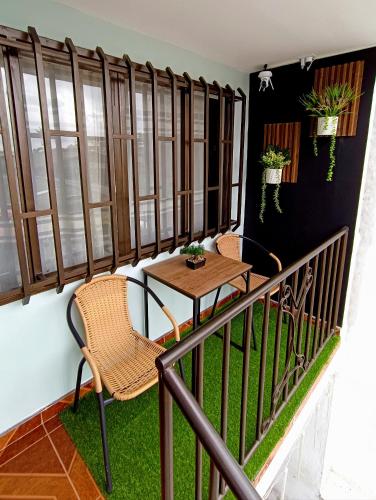 Un balcón o terraza en Acogedora casa céntrica