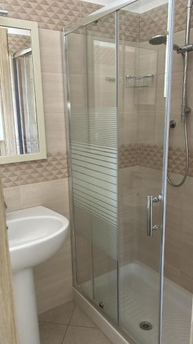 a bathroom with a shower and a sink at Appartamenti da Matteo in Peschici