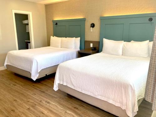 Un ou plusieurs lits dans un hébergement de l'établissement Castle Inn