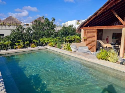 Hồ bơi trong/gần Premium Apartment in Tulum 2 Bedrooms Roof Top Pool - Aldea Zama