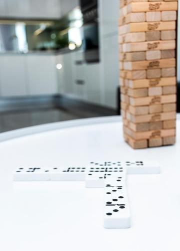 a kitchen counter with a stack of pizza boxes at Ellipse Waterfall Luxury Apartments in Midrand