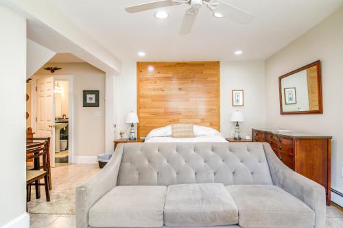 a bedroom with a bed and a couch at Pet-Friendly Garden Studio about 25 Mi to Boston! in Scituate