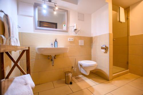 Koupelna v ubytování Hotel Stadtgut
