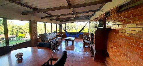 Posezení v ubytování Hacienda Moncora, un lugar hermoso para toda la familia y los amigos