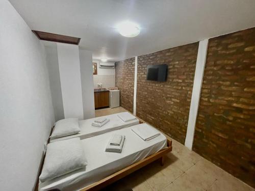 Postel nebo postele na pokoji v ubytování Cozy Place