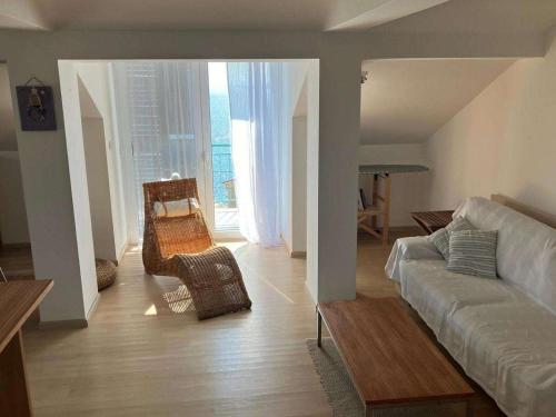 Apartments with parking space Senj - 23402