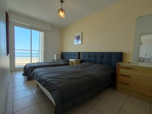 Photo de la galerie de l'établissement Charmant appart 1 chambre, proche plage, parking, idéal pour 5 pers. - FR-1-323-302, à Saint-Jean-de-Monts