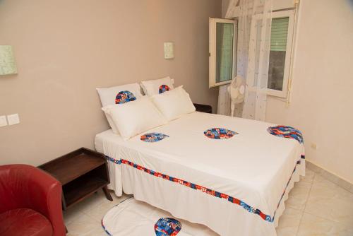Katil atau katil-katil dalam bilik di Chambres D'hôtes à louer Villa Luciana