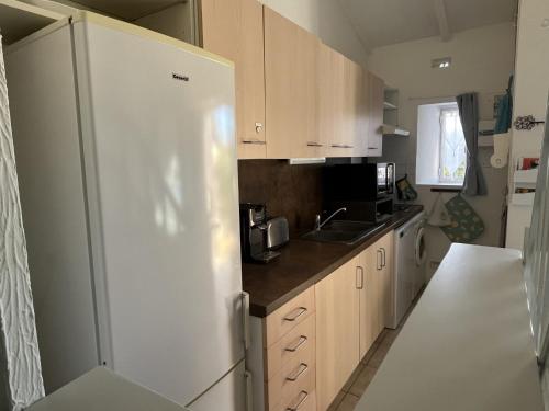 Photo de la galerie de l'établissement Villa T4 climatisée à Le Barcarès, terrasse, parking, proche plage, idéale famille, animaux ok - FR-1-799-26, au Barcarès