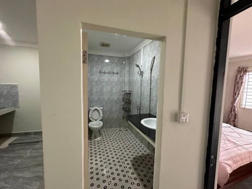 Bilik mandi di T&L Apartment