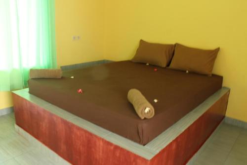 Кровать или кровати в номере Melbao Homestay