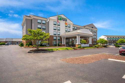 a rendering of a hotel with a parking lot at Holiday Inn Express & Suites - Ocean City by IHG in Ocean City