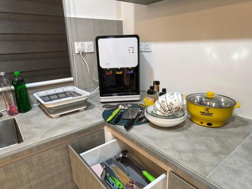 Kuchyň nebo kuchyňský kout v ubytování Sky Suite Meritus Residence in Perai
