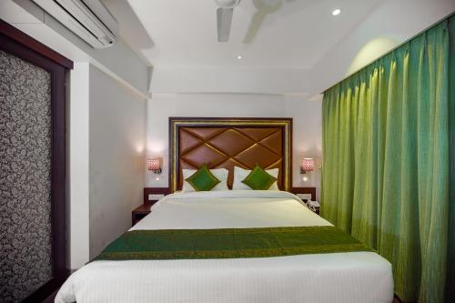 Hotel Laxvas- The Business Hotelにあるベッド