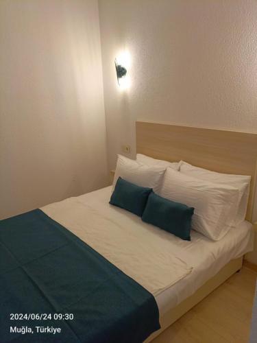 Katil atau katil-katil dalam bilik di Mia Hill Suites