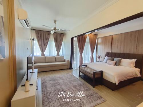 Postel nebo postele na pokoji v ubytování SM Sea Villa by Langkawi Lagoon Resort
