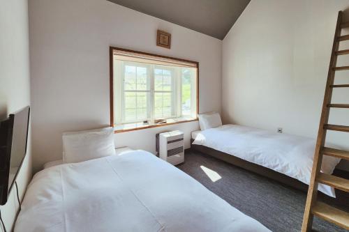 Sunshine Hakuba Ski-to-door by JAMSZ ROYALE